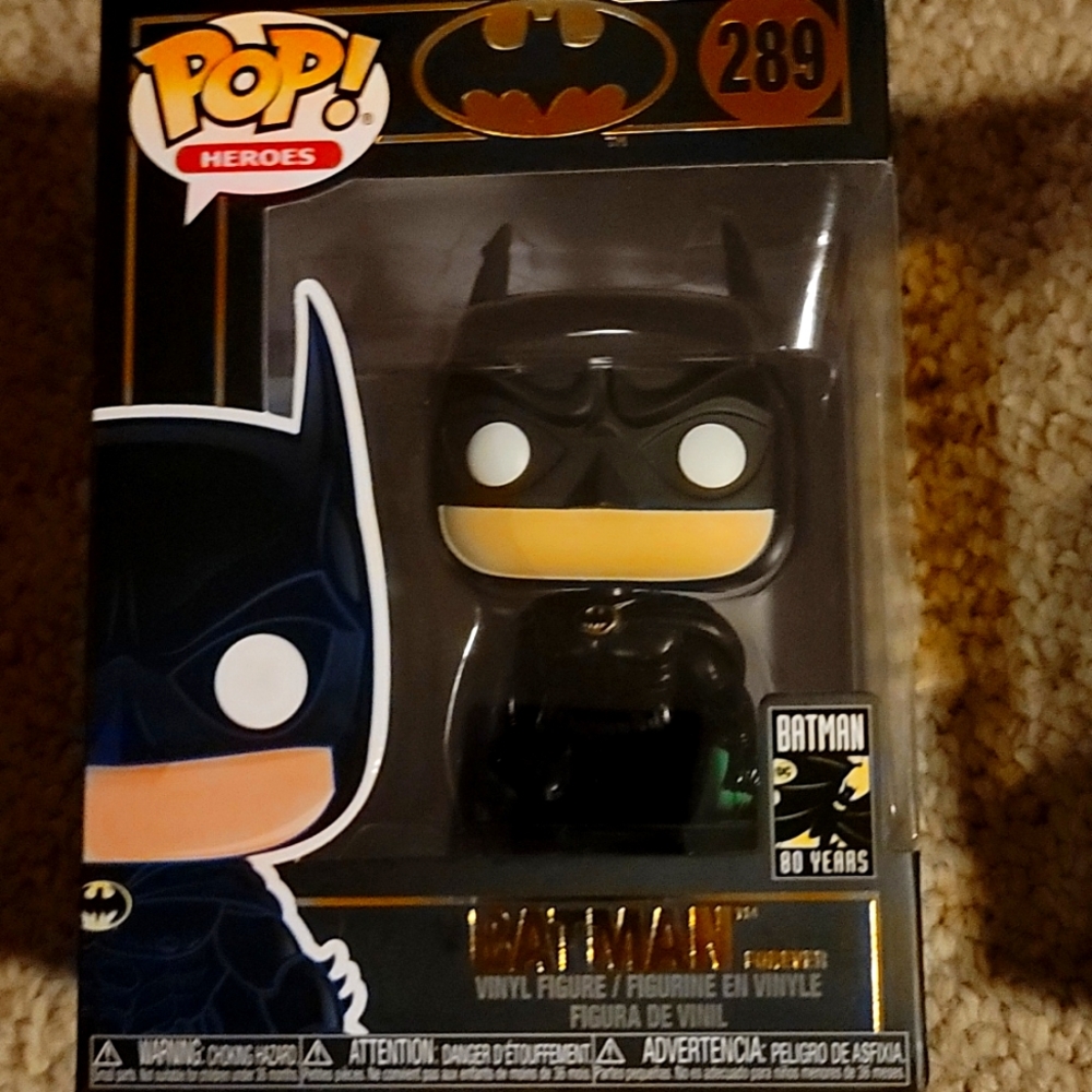 Batman holding riddle